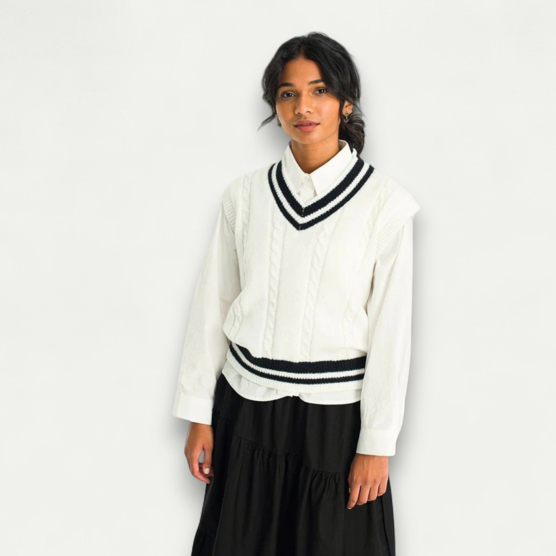 Azirado Women's White Cable Knit Vest with Black Stripes Over a Button-Up Shirt