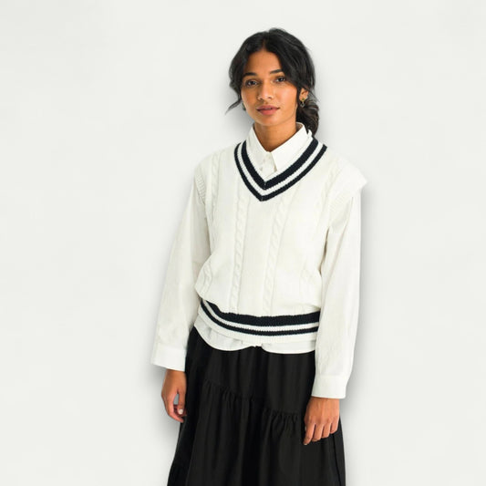 Azirado Women's White Cable Knit Vest with Black Stripes Over a Button-Up Shirt